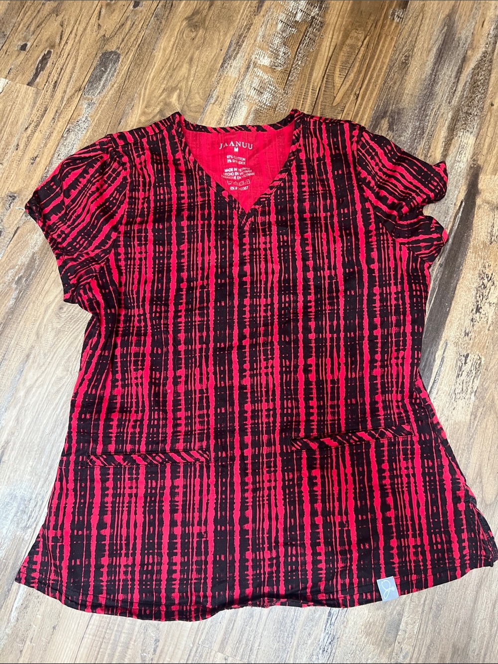 Jaanuu Red & Black Patterned V-Neck Scrub Top